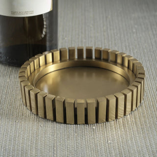 Gold metal wine bottle coaster with sculptural modern design — brushed aluminum tabletop accessory for bar or holiday entertaining by Third & Main.