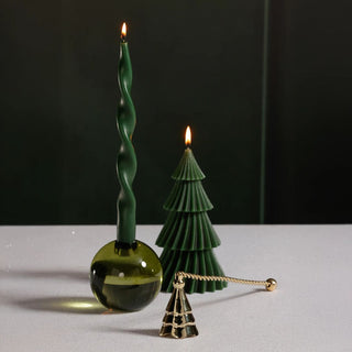Gold candle snuffer with tree-shaped bell and twisted handle, elegant metal accessory for extinguishing candles with style. Third & Main, Home Decor, Holiday Decor, Winter Decor, Contemporary Decor, Modern Farmhouse Decor, Christmas Decor, Giftable Items