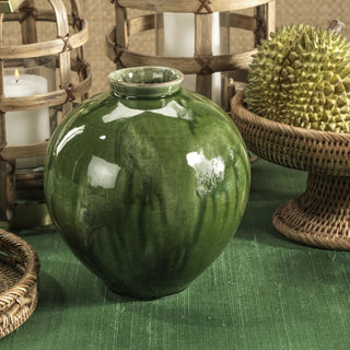 green watercolor ceramic vase styled on coffee table with florals and neutral luxury living room decor