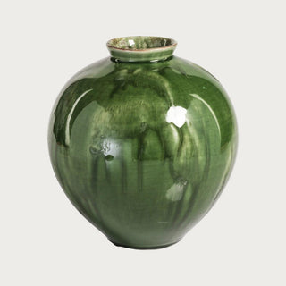 green watercolor ceramic vase styled on coffee table with florals and neutral luxury living room decor