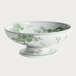 Green and white Chinoiserie footed ceramic bowl featuring a soft botanical pattern on a crisp white base. A timeless yet fresh spring decor accent perfect for dining tables, consoles, kitchen islands, and curated shelf styling.