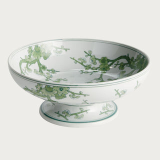 Green and white Chinoiserie footed ceramic bowl featuring a soft botanical pattern on a crisp white base. A timeless yet fresh spring decor accent perfect for dining tables, consoles, kitchen islands, and curated shelf styling.