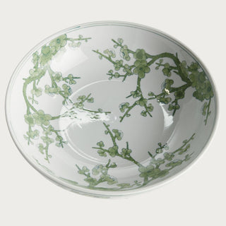 Green and white Chinoiserie footed ceramic bowl featuring a soft botanical pattern on a crisp white base. A timeless yet fresh spring decor accent perfect for dining tables, consoles, kitchen islands, and curated shelf styling.