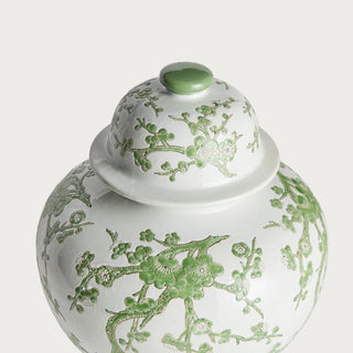 Large green and white Chinoiserie ginger jar with lid featuring a soft botanical pattern on a crisp white ceramic base. A timeless yet fresh spring decor accent for entryways, shelves, sideboards, and curated interiors with classic and modern appeal.