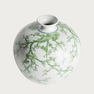 Green and white Chinoiserie ceramic vase with a soft botanical pattern on a crisp white base. A timeless spring decor accent perfect for styling consoles, shelves, dining tables, and entryways with faux florals or as a standalone statement piece.