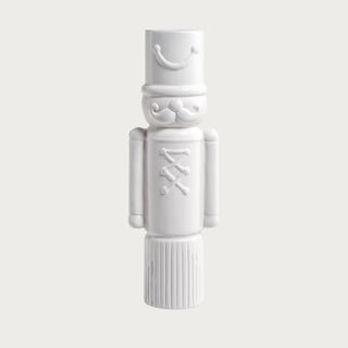 Matte white decorative ceramic soldier figurine – minimalist holiday nutcracker décor.