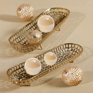 Large Gold Oval Alloy Tray styled with decorative spheres and glass accents on neutral table for elegant home décor.