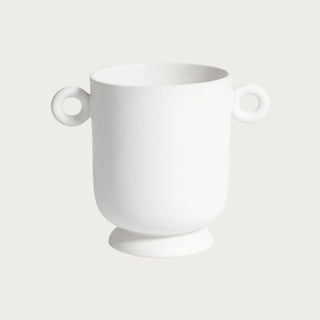 Large white ceramic planter with loop handles and rounded sculptural shape, styled as a minimalist decorative vessel