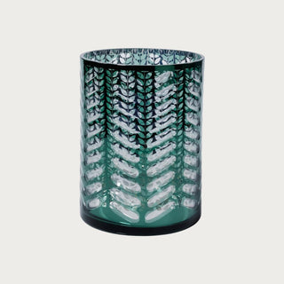 Bring organic sophistication to your space with this metallic green laser-etched hurricane candle holder—where nature meets modern elegance. Third & Main, Home Decor, Holiday Decor, Winter Decor