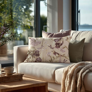 14x20 linen botanical lumbar pillow with soft mauve florals, dragonflies, and bird motif styled on a cream sofa in a luxury Malibu California modern contemporary living room with large windows and ocean view.