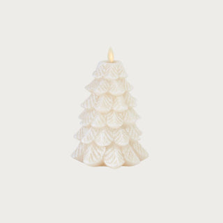 Luminara white snowy tree flameless candle, 6.5 inches tall, made of sculpted white wax with a realistic LED flickering light, featuring delicate snow-textured detailing and soft shimmer, styled against a neutral background for modern winter décor inspiration from Third & Main