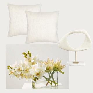 Luxe Version 3  Curated Home Decor Box Third & Main,I Includes a premade real touch floral with cymbidium orchids in creamy white and protea stems in a yellow green in an oblong glass vessel with white floral rock in the bottom, a white and marble sculpture object and 2  beautiful loser linen 20x20 down alt pillows. Home Decor Box, Luxury Home Decor, Luxury Decor, SpringHome Decor, Real Touch Floral Arrangement 