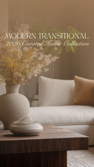 Elevated modern transitional living room evolved from modern farmhouse with an ivory sectional sofa, walnut coffee table, sculptural ceramic vase, and large windows filled with natural light