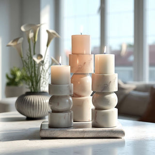 A modern marble candle holder arrangement styled on a tray—an effortless way to add height, warmth, and a quiet sense of polish to any surface.