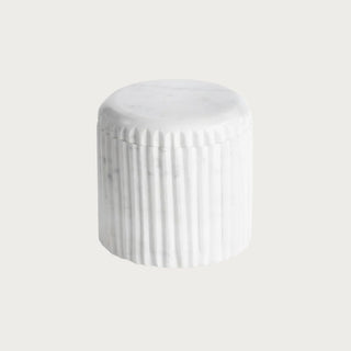 White marble lidded container with fluted detailing in contemporary design