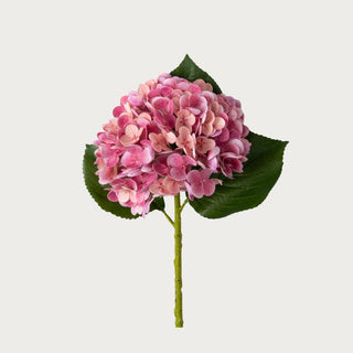 Mauve/dark pink hydrangea real touch faux floral stem from True Bloom Floral by Third & Main, ultra-realistic artificial bloom with full layered petals and green leaves, high-end home decor stem, True Bloom Floral, Real Touch