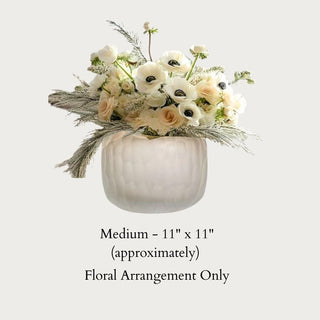 Medium custom Premade Floral arrangement by third & Main approximately 8" in diameter. Arrangement only = vase not included.