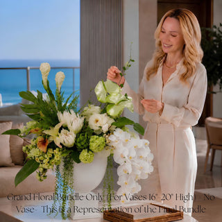The Garden Room Floral Bundle Grand styled in a white vase with white orchids, green snowballs, white protea, creamy ginger stems, anthurium, calla leaf, white lily of the valley, and lush greenery for elevated coastal and garden-inspired home decor.
