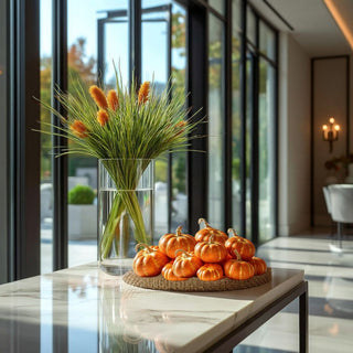 Mini orange pumpkin fillers styled in tray on table