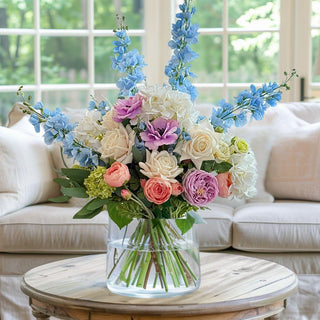 Morning Light True Bloom Real Touch Floral Arrangement - 3 Options Available
Morning_Light_True_Bloom_Real_Touch_Premade_Faux Floral_Arrangement made with light purple buttercup. white hydrangea, mini snowball stems, small oink roses, blue delphinium, light purple roses, cream roses and greenery. True Bloom Floral, Real Touch, Third & Main