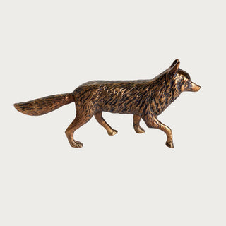 Mr Fox cast aluminum decorative sculpture shown in profile with an antique gold-bronze finish, textured coat, pointed ears, walking legs, and long tail.