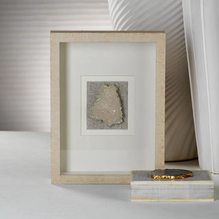 A natural/ beige box frame with a clear crystal with a delicate silver rim set on a soft gray linen fabric backing. The remainder of the inner frame is set on a matte white/cream background. Third & Main, Home Decor, Contemporary Decor, Luxury Living, Luxury Decor, Spring Decor, Summer Decor, Everyday Decor, Seasonal Decor