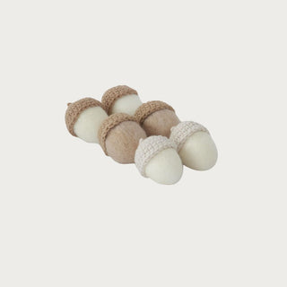 Set of neutral 2 Inch Felt Acorns shown in cream with cream top, light brown with brown top, and cream with brown top for soft fall bowl and tray styling.