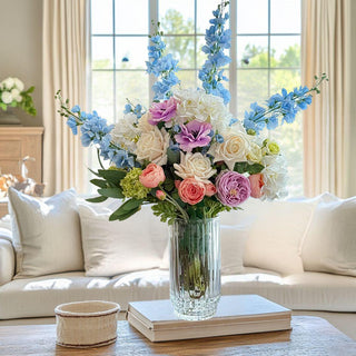 Morning Light True Bloom Real Touch Floral Arrangement - 5 Options Available
Morning Light True Bloom Real Touch Floral Arrangement - 3 Options Available
Morning_Light_True_Bloom_Real_Touch_Premade_Faux Floral_Arrangement made with light purple buttercup. white hydrangea, mini snowball stems, small oink roses, blue delphinium, light purple roses, cream roses and greenery. True Bloom Floral, Real Touch, Third & Main