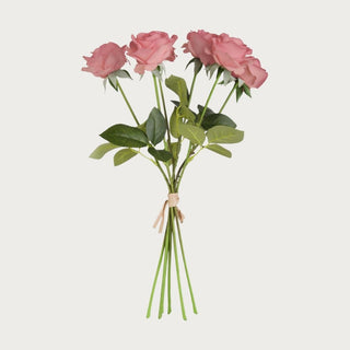 Pink True Bloom real touch rose bundle with six lifelike stems, featuring soft layered petals and natural green foliage on a clean neutral background.