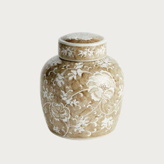 Product Image Alt Tag:
Province Lotus Lidded Jar, 9.25-inch ceramic ginger jar in taupe with intricate white lotus floral pattern and removable lid.
