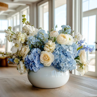 real touch blue hydrangea bundle styled in white ceramic bowl vase with cream roses and soft greenery in a bright modern home, luxury faux floral arrangement by Third & Main