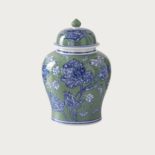 Sage green ceramic lidded ginger jar with detailed cobalt blue and white botanical floral pattern and coordinating striped trim.