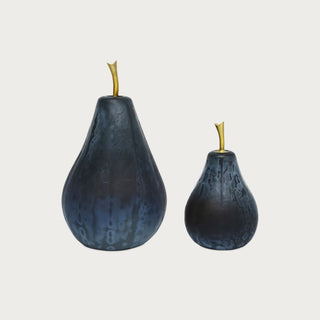 Set of two deep blue textured glass pear sculptures in 12.25-inch and 8-inch heights with graduated silhouettes and slender brass stems.