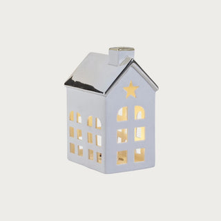 Set of two porcelain houses with polished gold roofs — elegant LED holiday décor in modern quiet luxury style by Third & Main.
