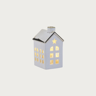 Set of two porcelain houses with polished gold roofs — elegant LED holiday décor in modern quiet luxury style by Third & Main.