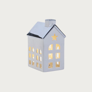 Set of two porcelain houses with platinum silver roofs — elegant glowing holiday décor in modern quiet luxury style by Third & Main.