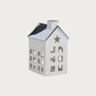 Set of two porcelain houses with platinum silver roofs — elegant glowing holiday décor in modern quiet luxury style by Third & Main.