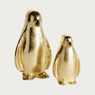 Set of two gold aluminum  penguin figurines for holiday and winter décor, 