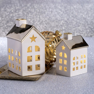 Set of two porcelain houses with polished gold roofs — elegant LED holiday décor in modern quiet luxury style by Third & Main.