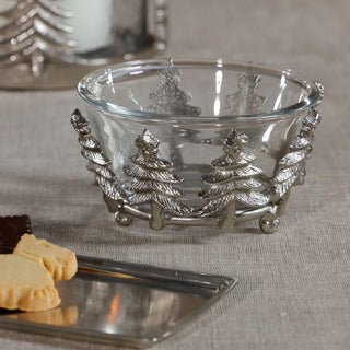“Silver and glass Christmas tree bowl styled on linen table with cookies and silver tray – festive tabletop decor.”