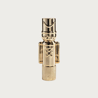 Single medium gold ceramic soldier with polished reflective surface and minimalist nutcracker design – 9.5-inch high-gloss gold decorative figure for sophisticated mantel, console, or tabletop Christmas styling in contemporary home décor.