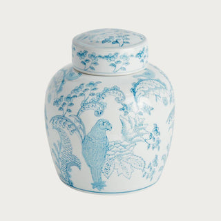Small blue and white ceramic ginger jar with parrot and botanical pattern and classic lidded silhouette