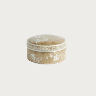 Small round Brown Chinoiserie Empress Ceramic Box showing its warm glazed finish, white botanical branch pattern, and detailed border around the lid.