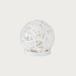 White scrolled snowflake LED water globes with swirling glitter effect — elegant holiday décor set available in large and small sizes by Third & Main.
