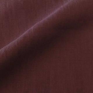 Close-up of the So Soft Linen Maroon pillow fabric showing its deep wine-red color and fine woven linen texture.