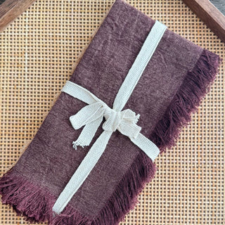 Stonewashed linen fringe napkin set in dusty pink and aubergine