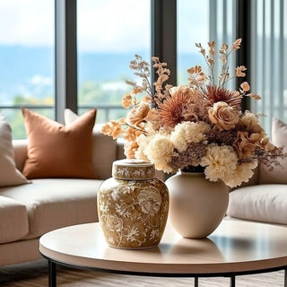 Styled Product Image Alt Tag:
Province Lotus Lidded Jar, 9.25-inch ceramic ginger jar in taupe with intricate white lotus floral pattern and removable lid.
