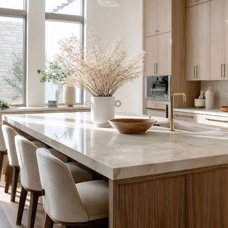 Styled Loop Handle white ceramic vase/planter styled on a Luxury kitchen island countertop 