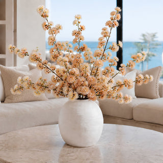 Styled white konos vase with 41 inch true bloom real touch linen/peach blossom branches from True Bloom Floral. 