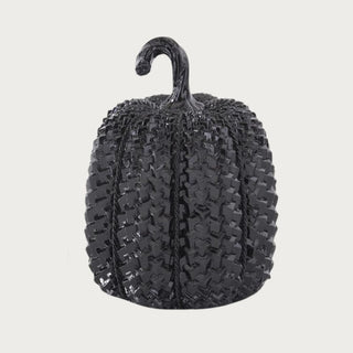 Tall glossy black resin gourd-shaped pumpkin with raised nubby texture, reflective black finish, and looped stem for fall mantels, consoles, and Halloween displays.